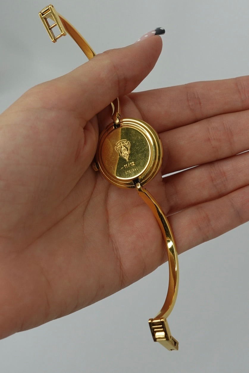 103. Gucci Bezel Gold Bracelet Vintage Watch