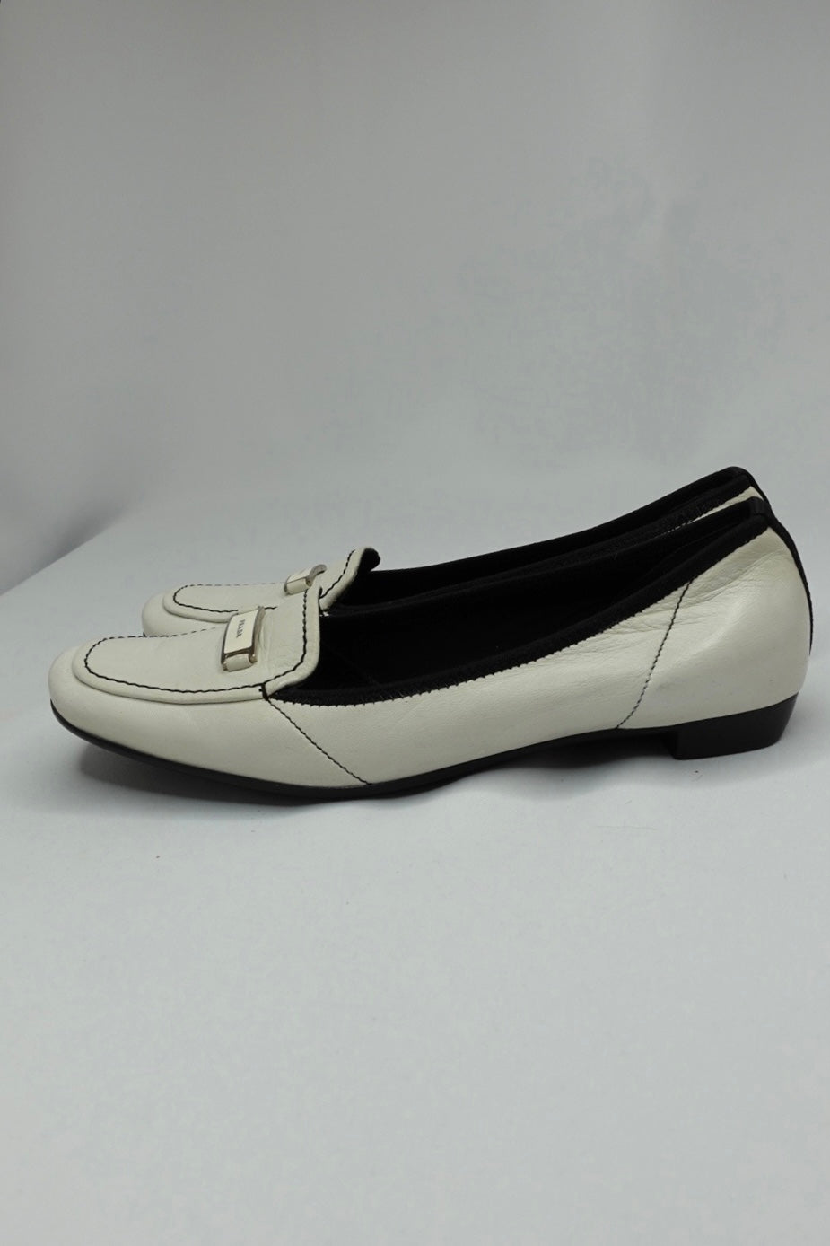 047. Prada White Loafers 37