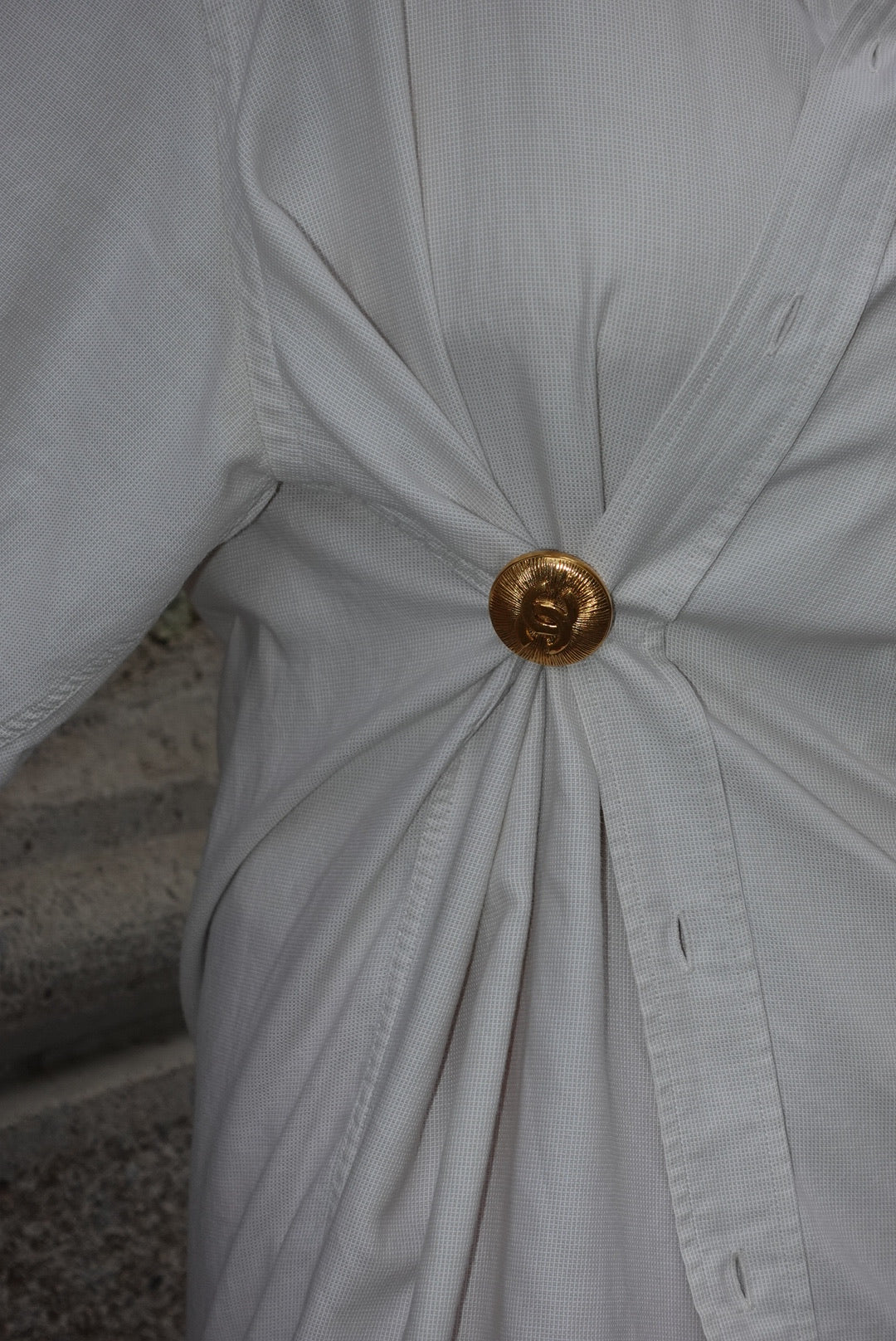 146. Chanel Vintage Clip Gold-Toned Round Logo Brooch