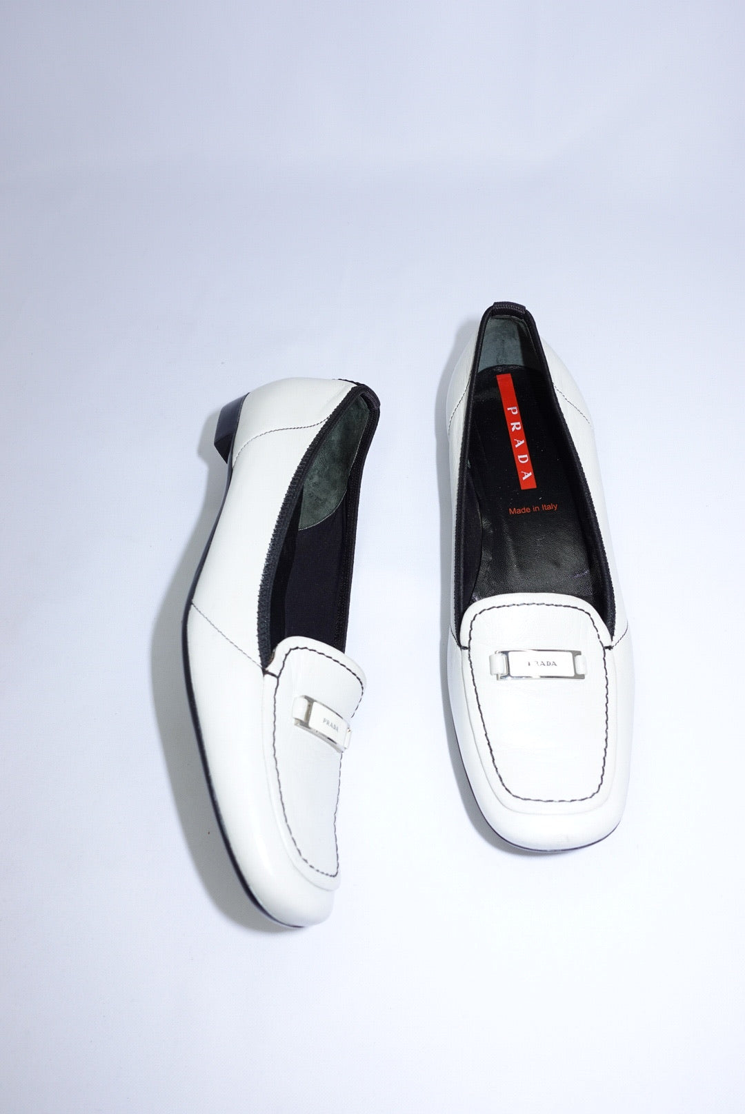 047. Prada White Loafers 37