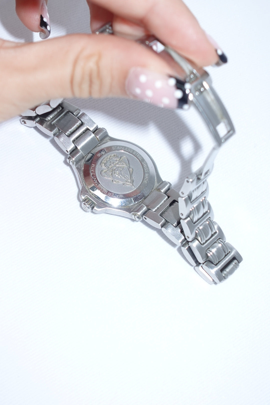 101. Gucci Vintage Silver Toned 9040L Quartz Black Dial Vintage Watch