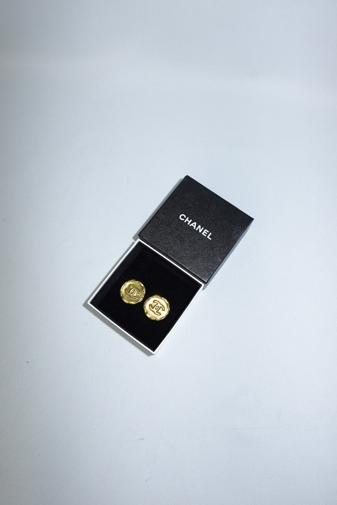 148. Chanel Vintage Gold Logo Clip Earrings