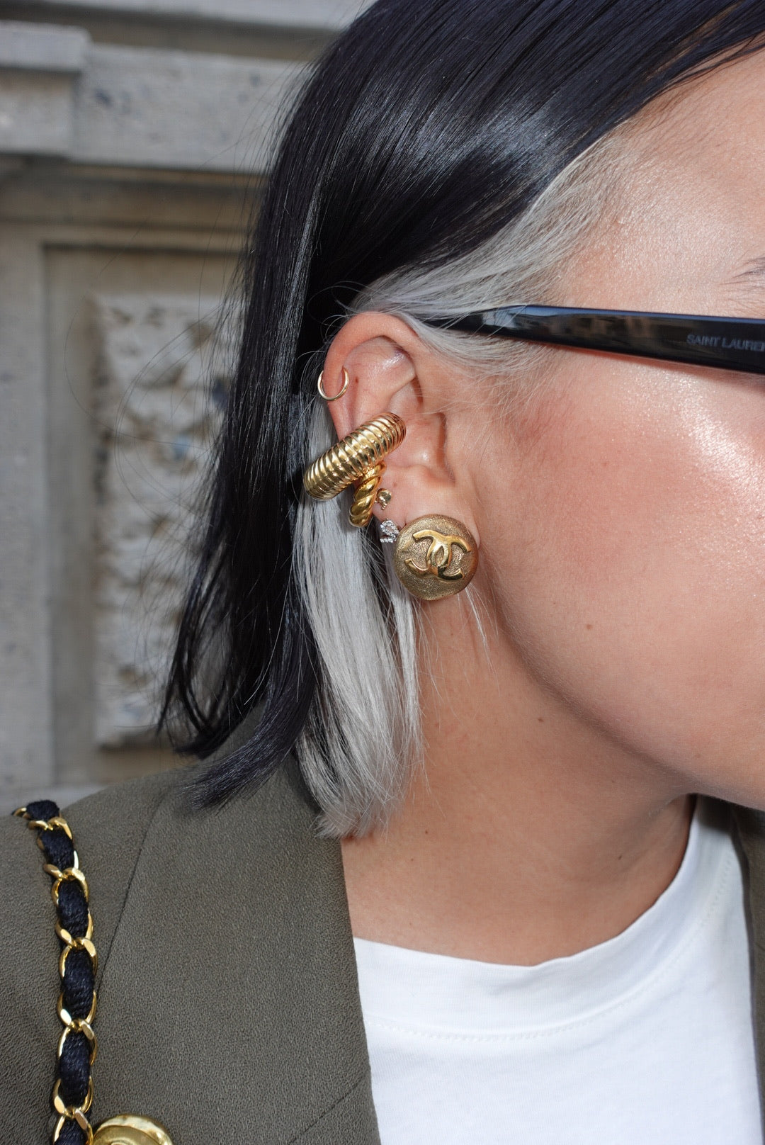 144. Chanel Vintage Clip Gold-Toned Round Logo Earrings