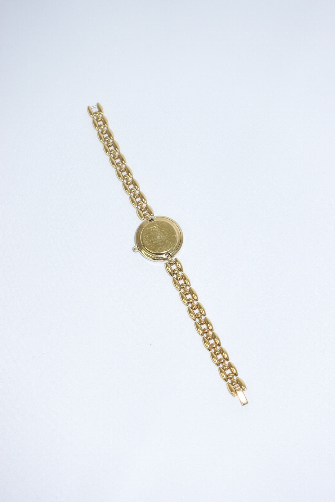 102. Gucci Bezel Gold Vintage Watch