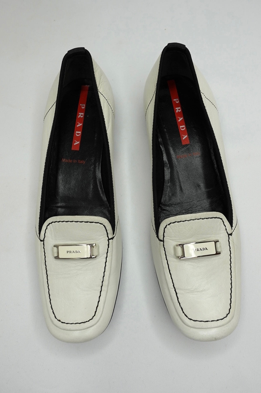 047. Prada White Loafers 37