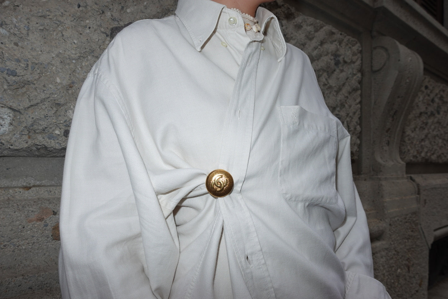 146. Chanel Vintage Clip Gold-Toned Round Logo Brooch