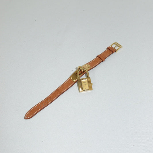 Orologio vintage Hermès Kelly con cinturino color cammello
