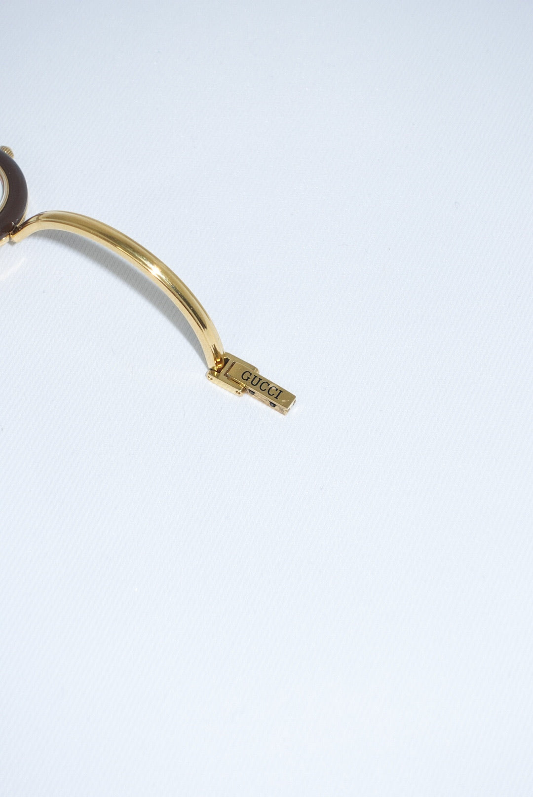 103. Gucci Bezel Gold Bracelet Vintage Watch