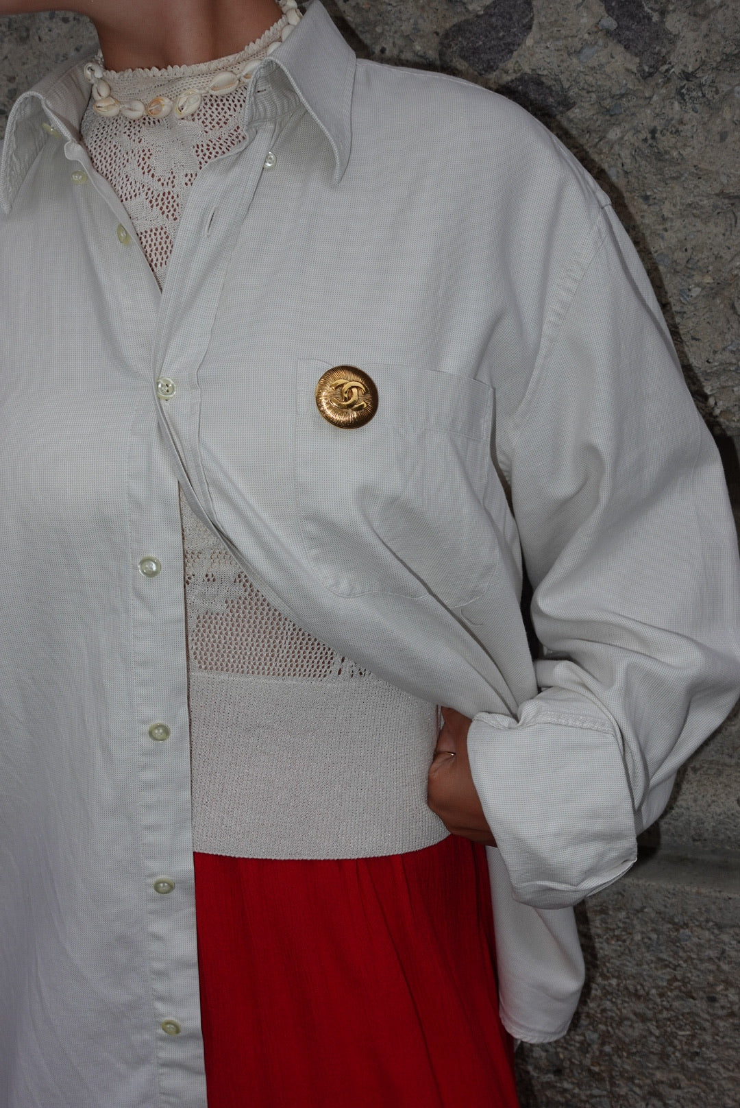 146. Chanel Vintage Clip Gold-Toned Round Logo Brooch
