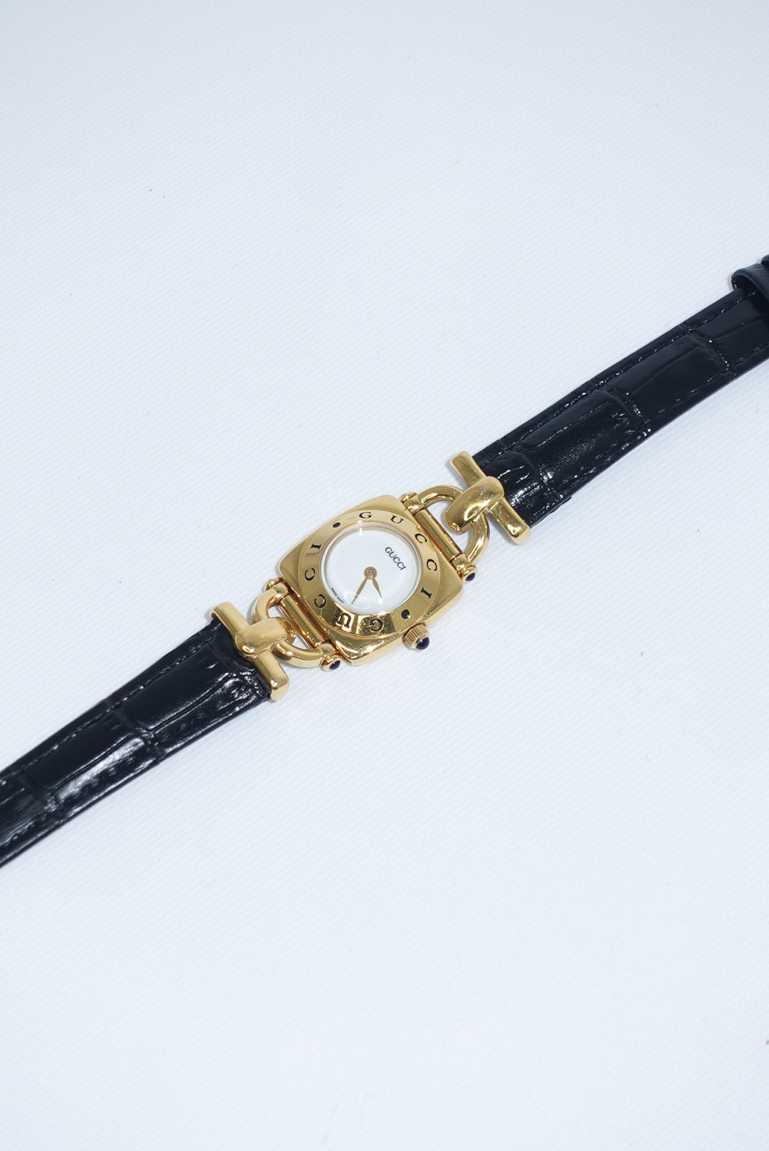 099. Gucci Vintage 6300L Gold Watch With Black Leather Strap