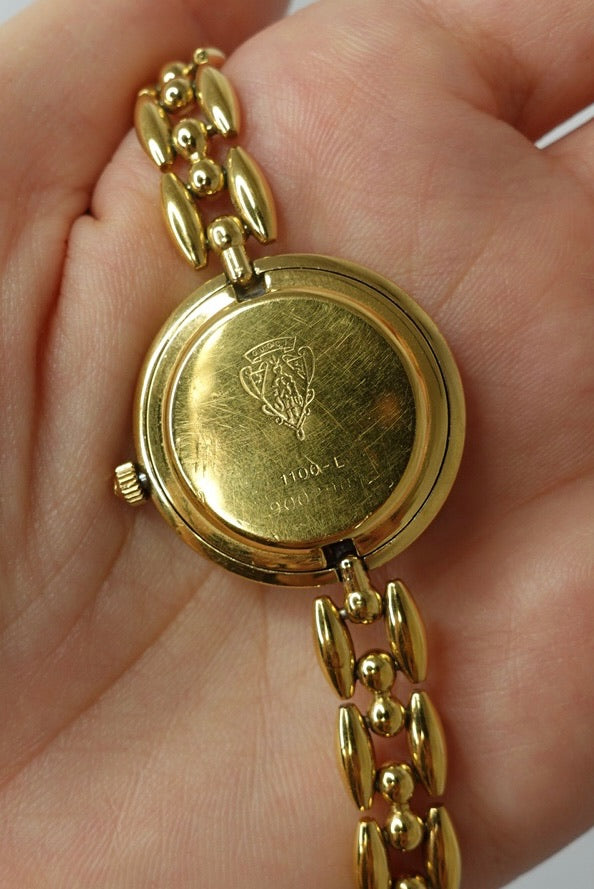 102. Gucci Bezel Gold Vintage Watch