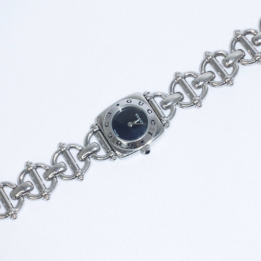 Silver watch with chain bracelet on a white background