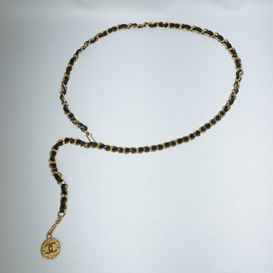 Chanel gold chain belt with black leather and medallion charm