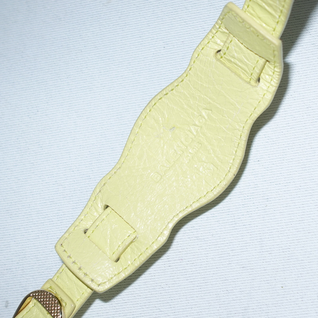 Bracciale giallo con borchie Balenciaga