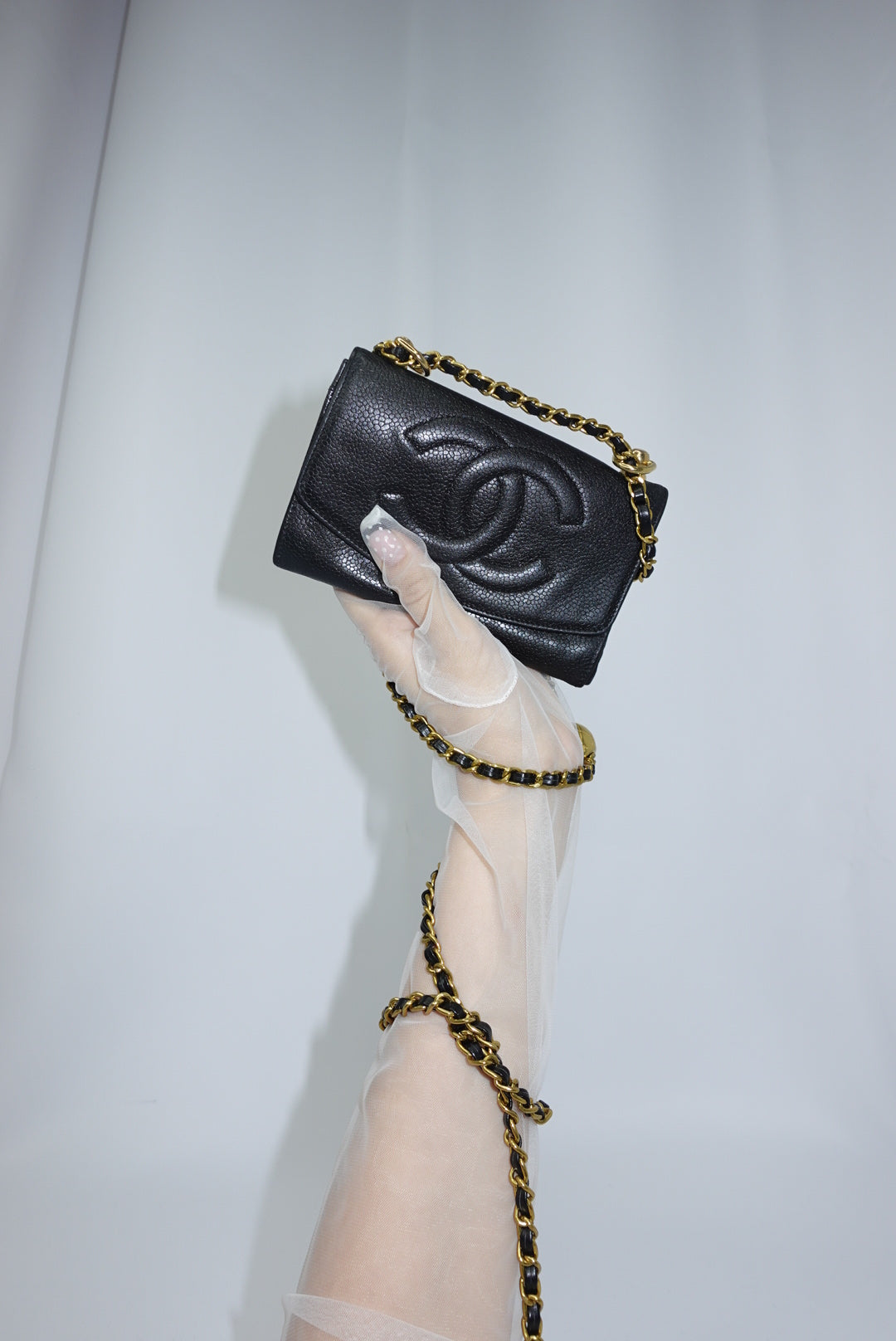 126. Re-Worked Chanel Medium Black Caviar Leather W.O.C.