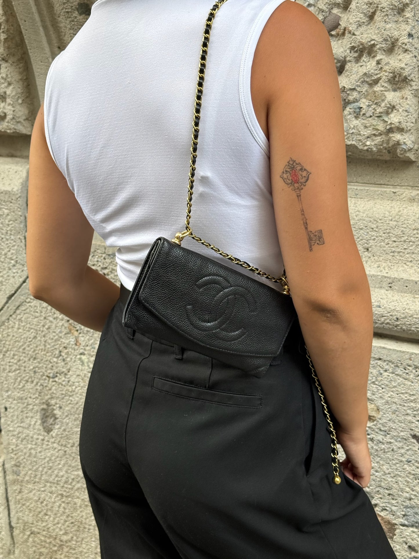 127. Chanel Re-Worked Vintage Long Flap W.O.C. Black Caviar CC logo