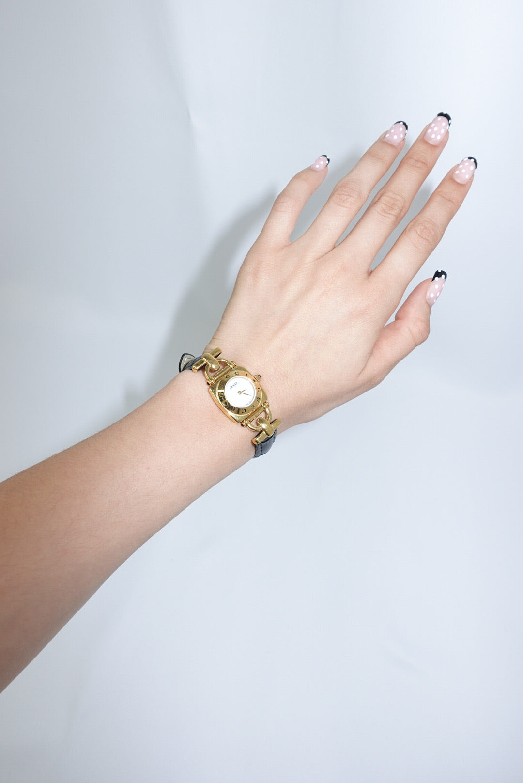 099. Gucci Vintage 6300L Gold Watch With Black Leather Strap