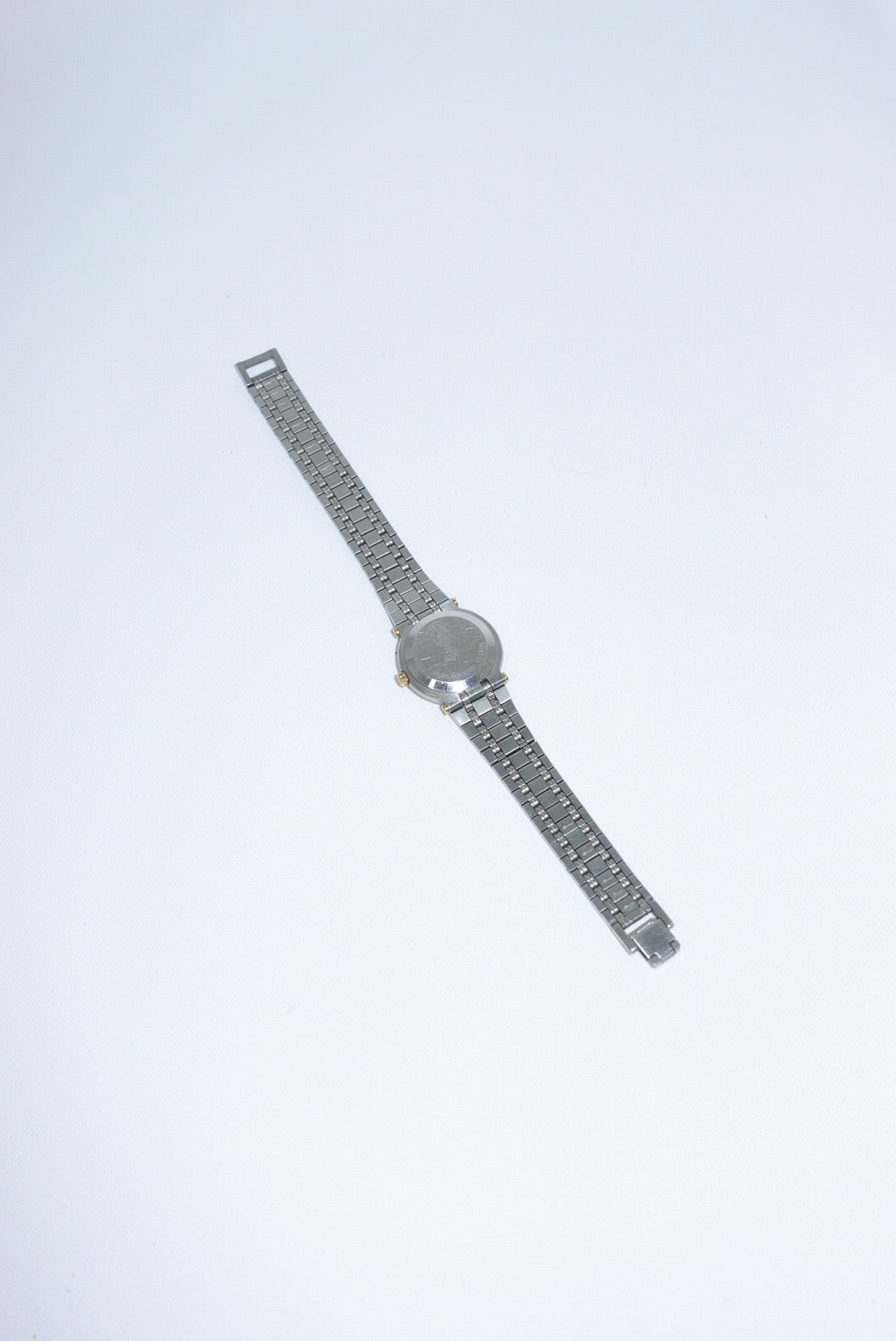 100. Gucci Vintage Silver Toned 9000L Quartz Ivory Dial Vintage Watch