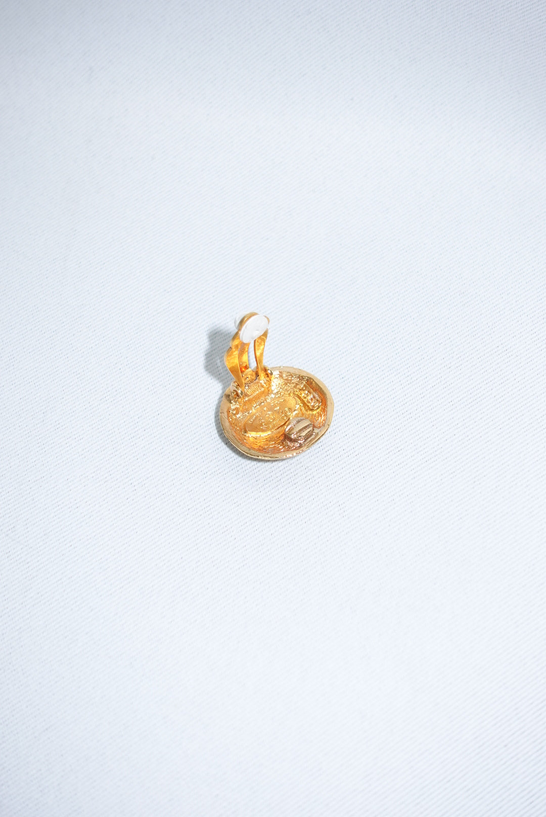 144. Chanel Vintage Clip Gold-Toned Round Logo Earrings