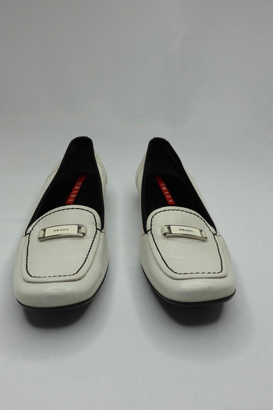 047. Prada White Loafers 37