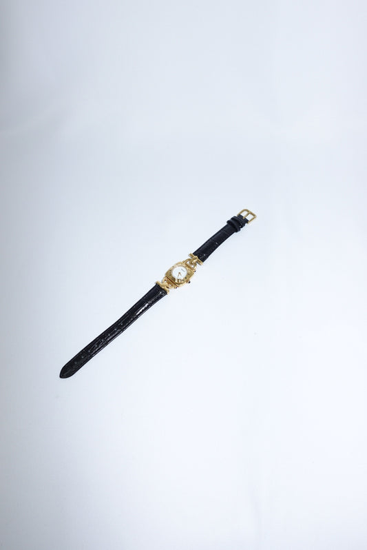 099. Gucci Vintage 6300L Gold Watch With Black Leather Strap