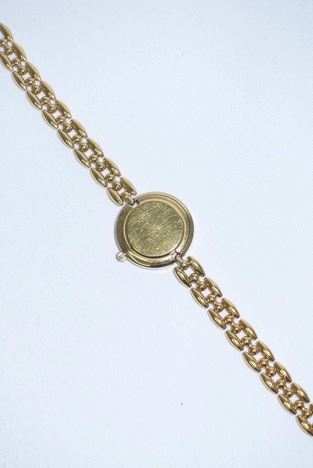 102. Gucci Bezel Gold Vintage Watch