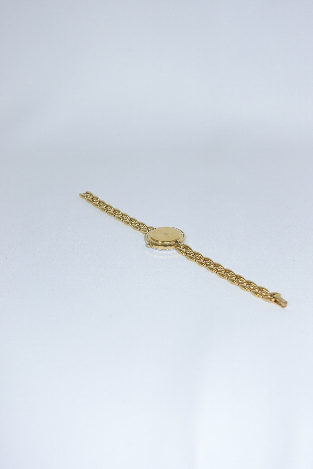 102. Gucci Bezel Gold Vintage Watch
