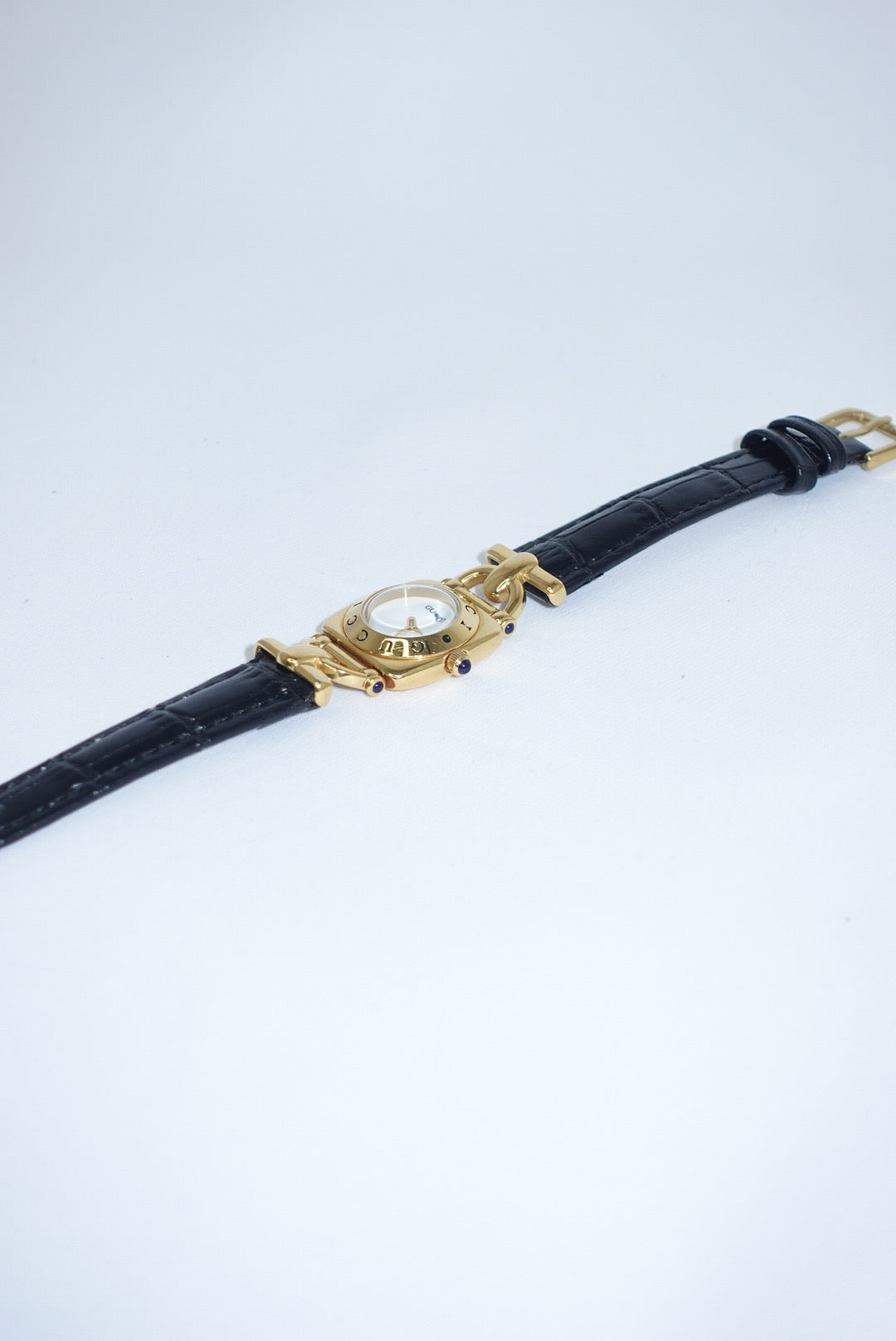 099. Gucci Vintage 6300L Gold Watch With Black Leather Strap