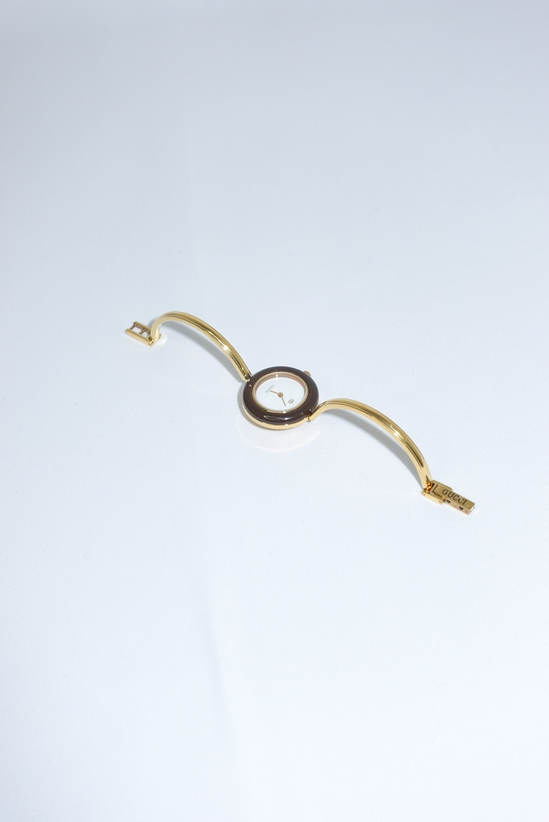103. Gucci Bezel Gold Bracelet Vintage Watch