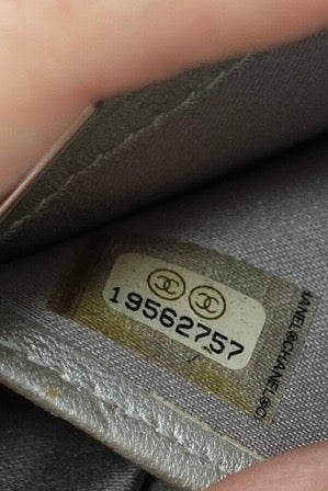 019. Re-Worked Chanel Zip Black W.O.C. Silver Hardware Limited Edition Camelia