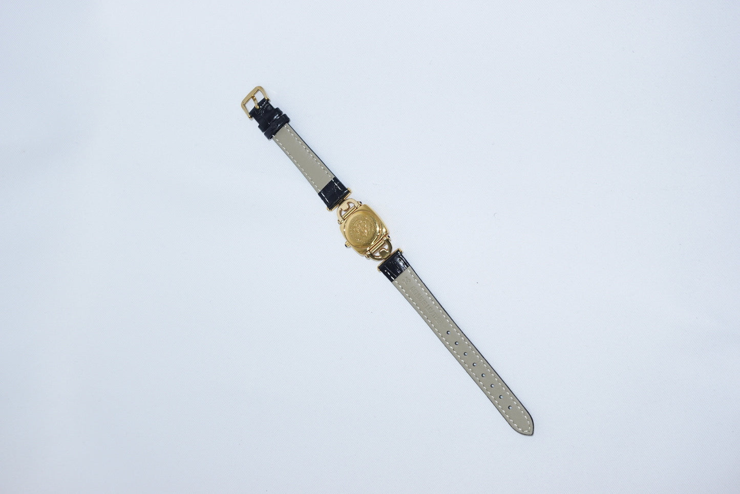 099. Gucci Vintage 6300L Gold Watch With Black Leather Strap