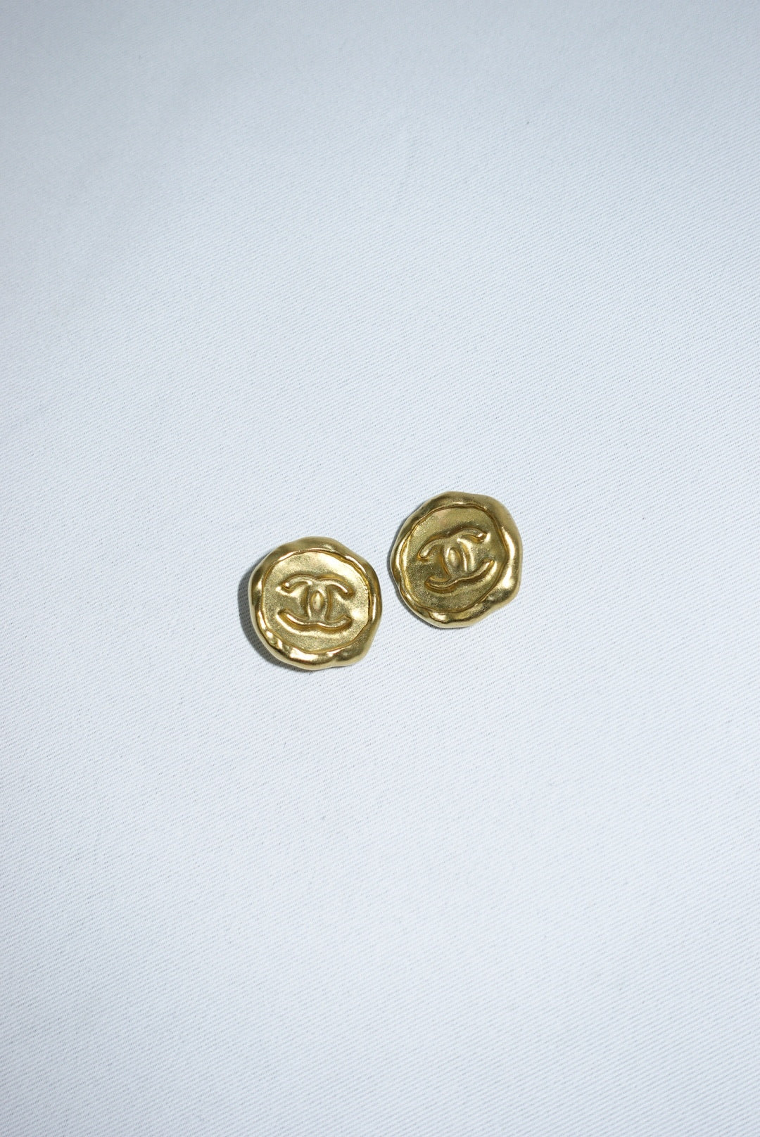 148. Chanel Vintage Gold Logo Clip Earrings