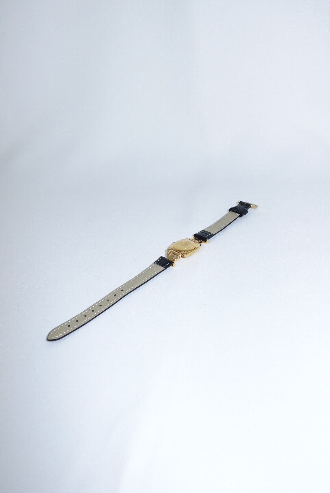 099. Gucci Vintage 6300L Gold Watch With Black Leather Strap