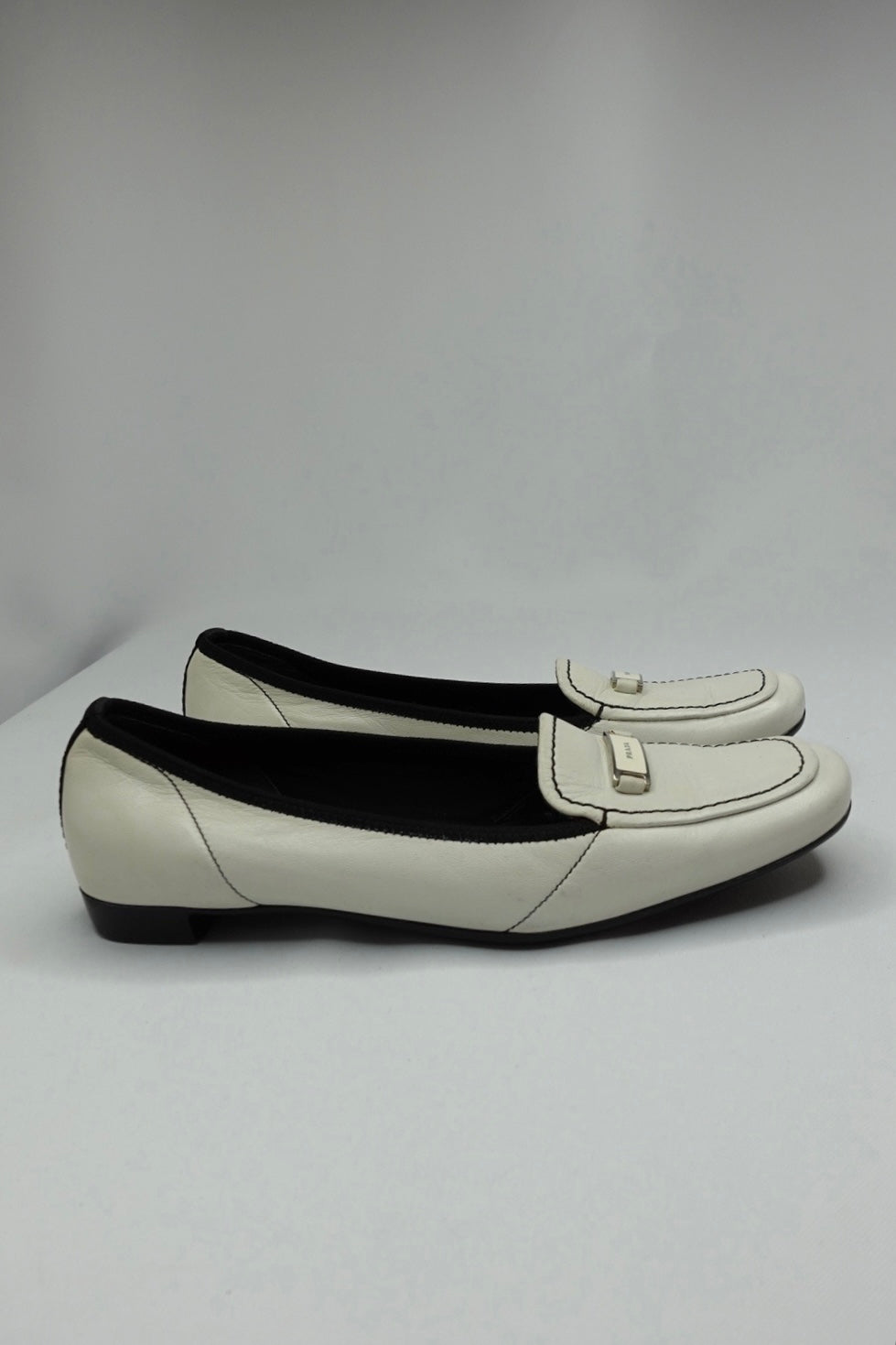 047. Prada White Loafers 37