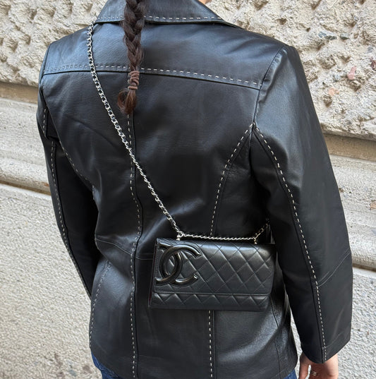 Vintage leather jacket with contrast stitching back view