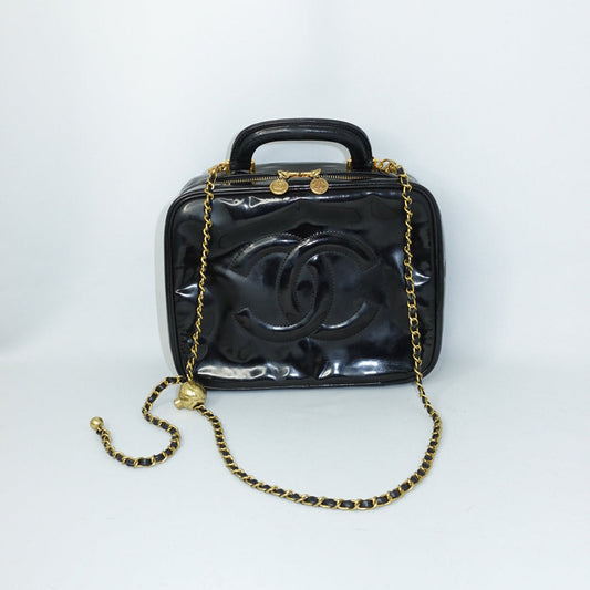 chanel black patent leather vanity bag front