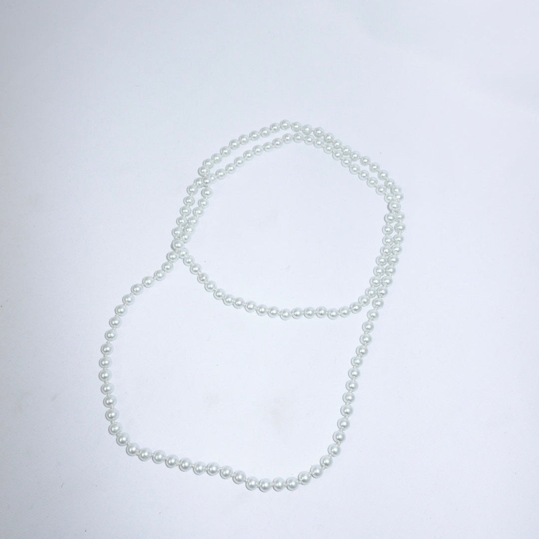 Collana sautoir vintage lunga con perle finte