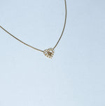     Christian Dior vintage gold necklace featuring crystal heart pendant