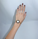     Authentic Gucci gold-toned bezel watch with white dial
