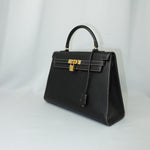 hermes kelly 32 black veau grain lisse bespoke