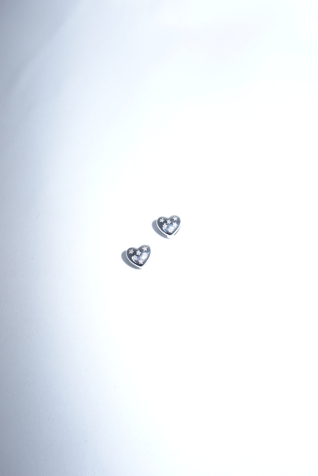 Stainless Steel Heart Silver Toned Earrings W/ Star Shaped Crystals