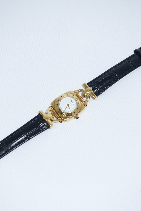 099. Gucci Vintage 6300L Gold Watch With Black Leather Strap