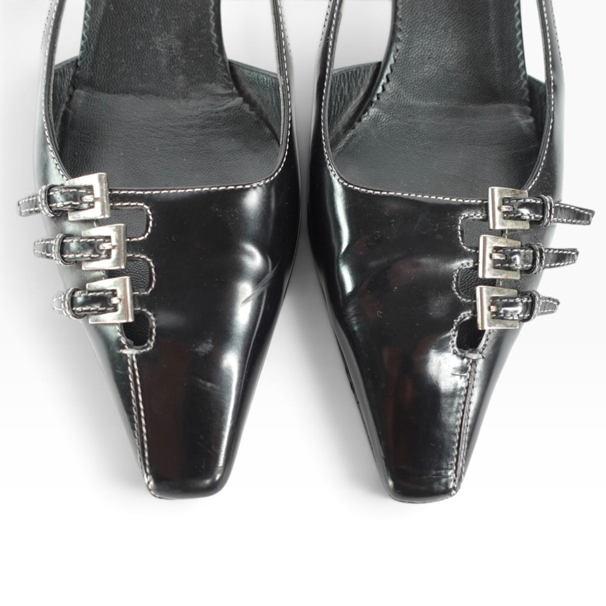 My Vintage Attire Prada black leather slingback kitten heels with triple buckle detail and pointed square toe.