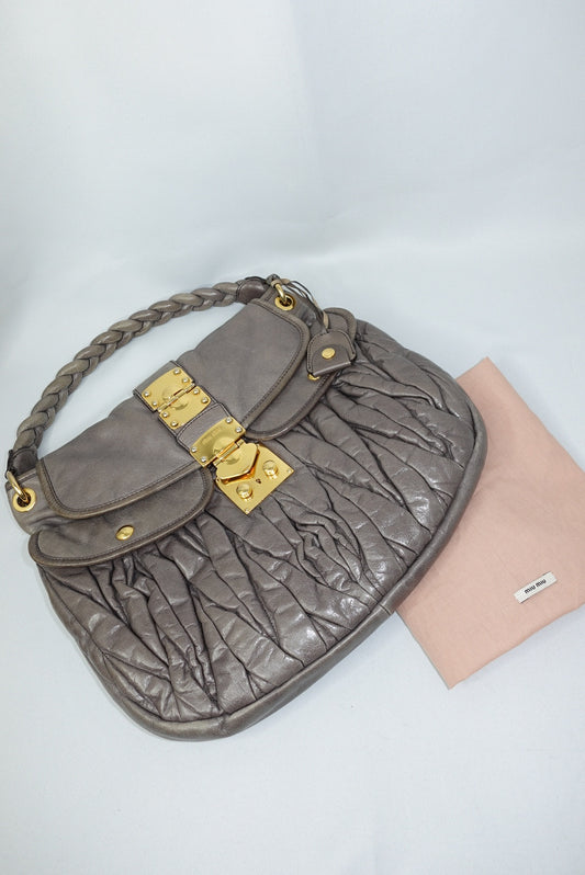 vintage miu miu quilted leather bag