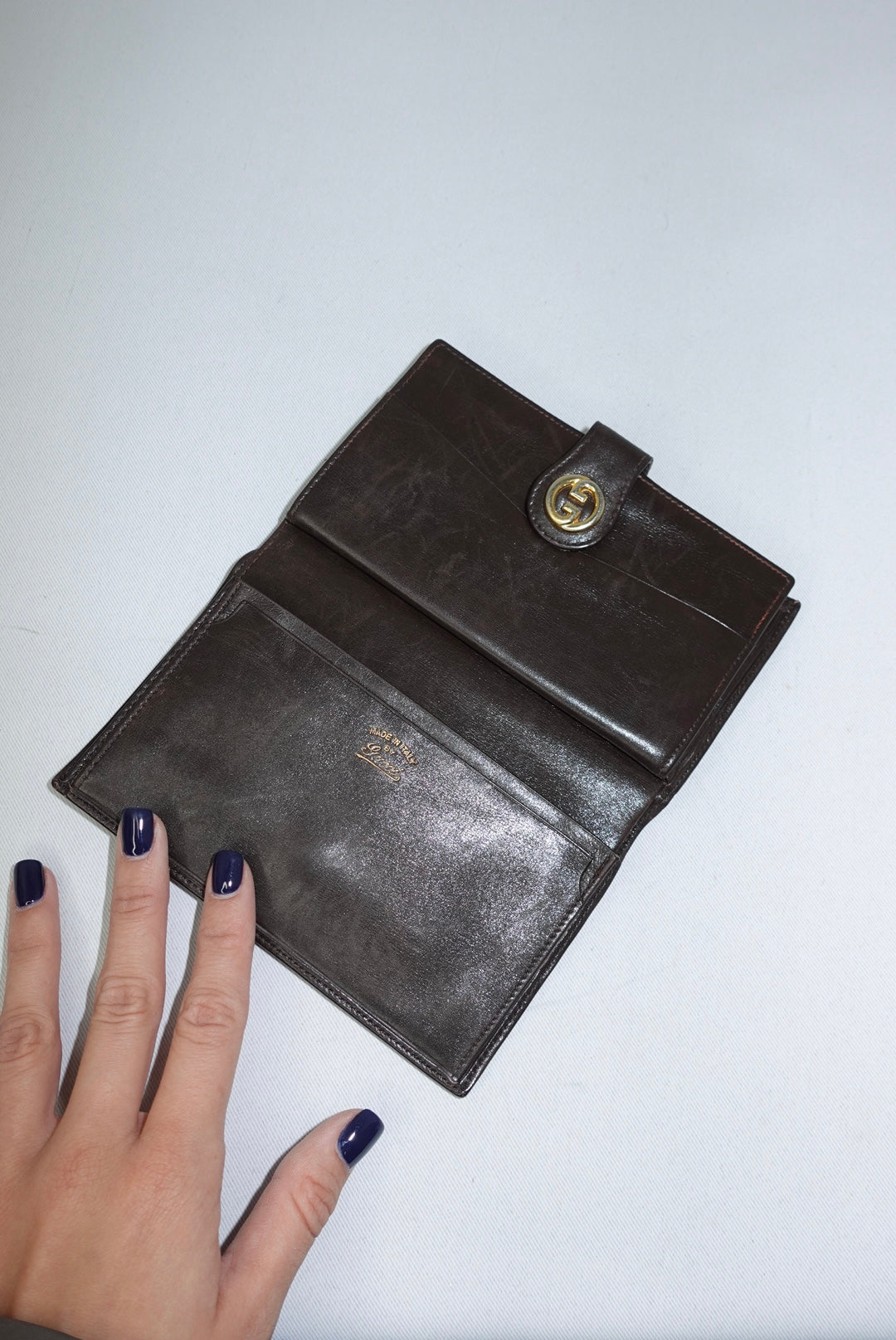 Portafoglio Gucci Vintage Medium in marrone cioccolato con logo GG color oro