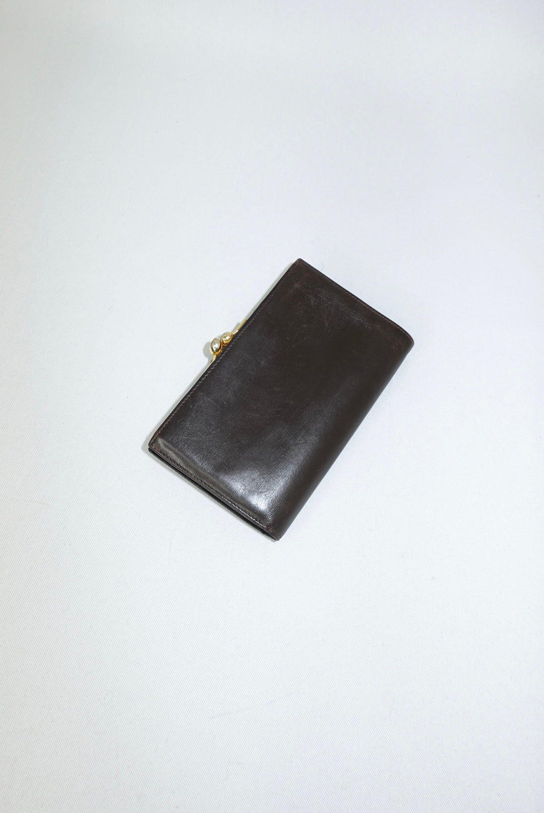 Portafoglio Gucci Vintage Medium in marrone cioccolato con logo GG color oro