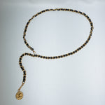 Chanel gold chain belt with black leather and medallion charm