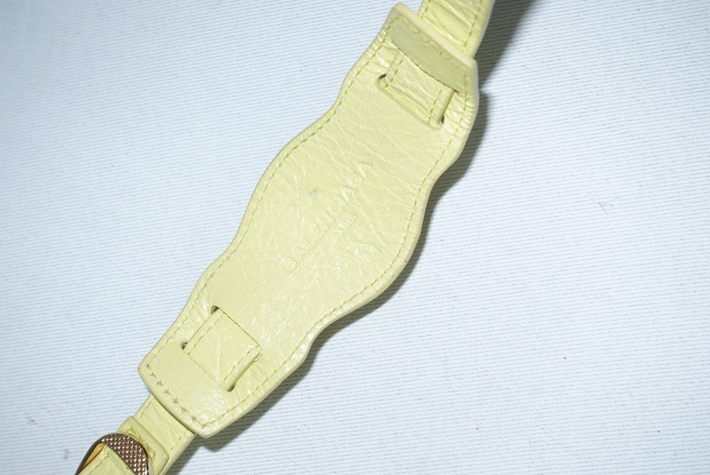 Bracciale giallo con borchie Balenciaga