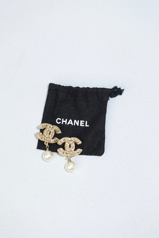 147. Chanel Vintage Gold Toned Logo Pendant Pearl Clip Earrings