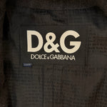 Dolce & Gabbana logo on a textured fabric background